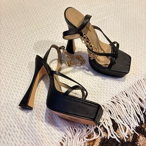 Black and gold platform heels